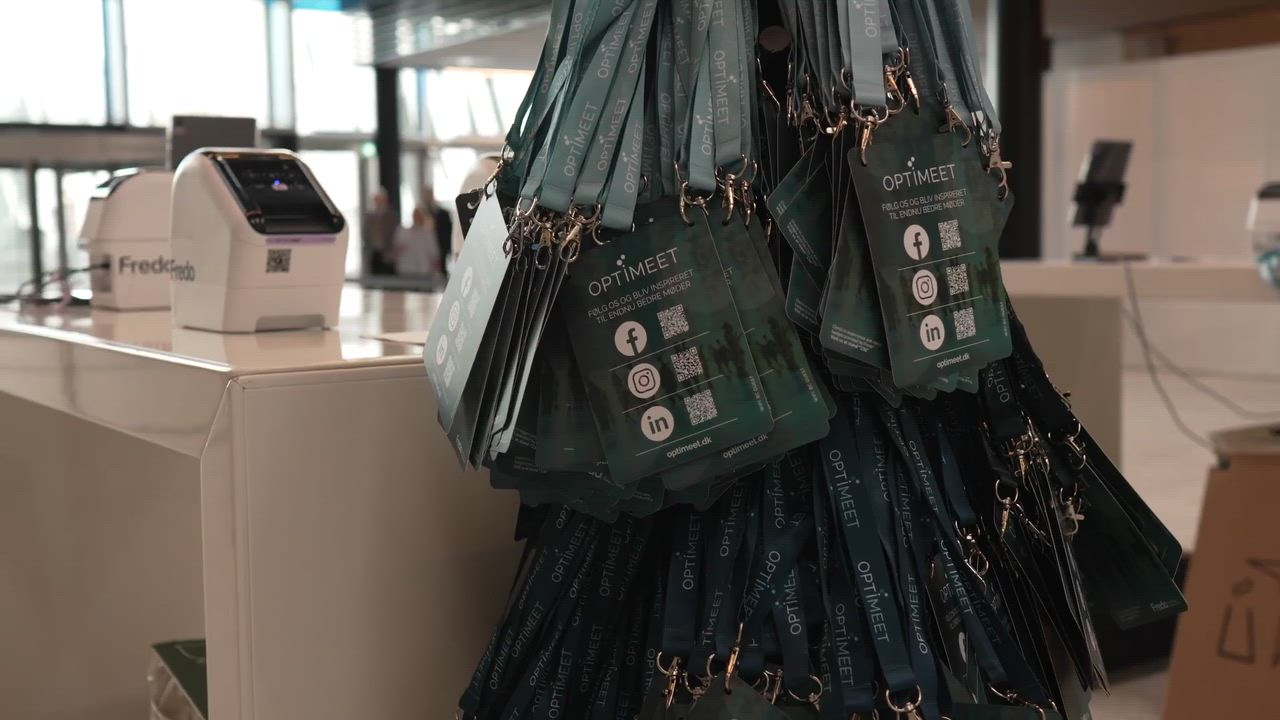 Fredo badge printing at an event check-in desk