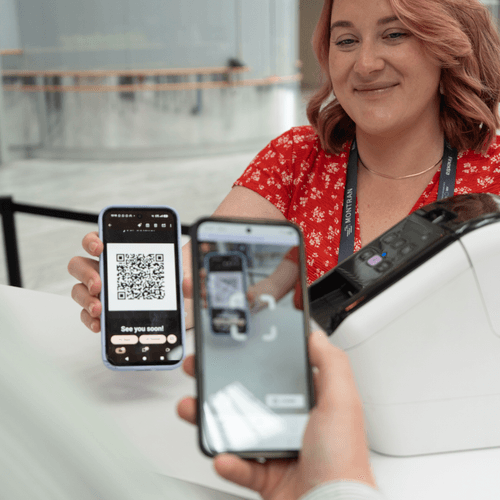 Fredo check-in desk with badge printer and check-in phone